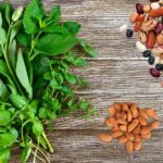 Picture of leafy greens, almonds, and beans.