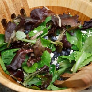 A bowl of mixed leafy greens.